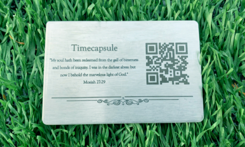 medium steel qr code plaque sitting on grass